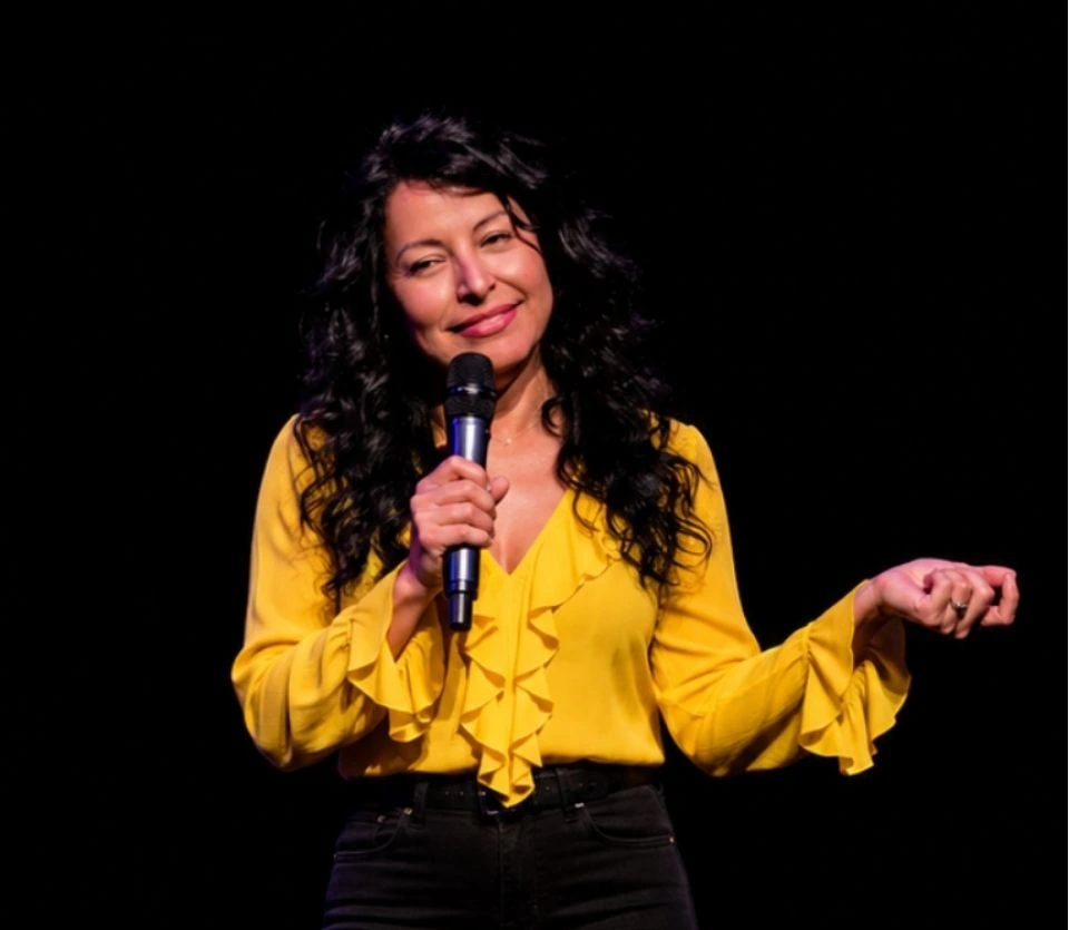 Comedian Mariza Brussolo performing live on stage